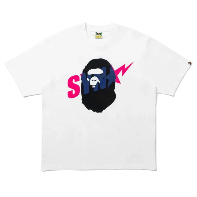 BAPE x Syna World graphic tee featuring a camouflage ape head logo