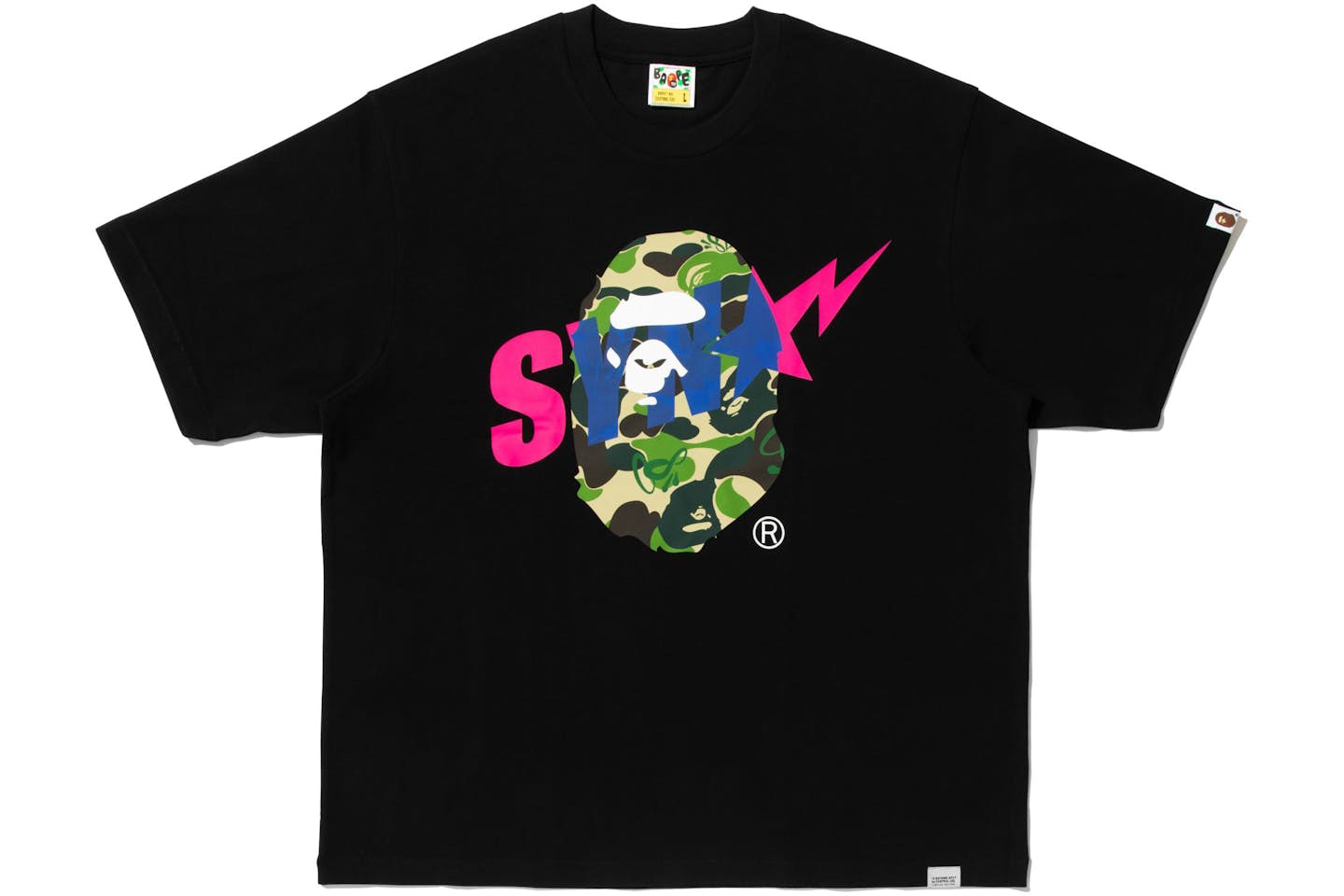 BAPE x Syna World graphic tee featuring a camouflage ape head logo