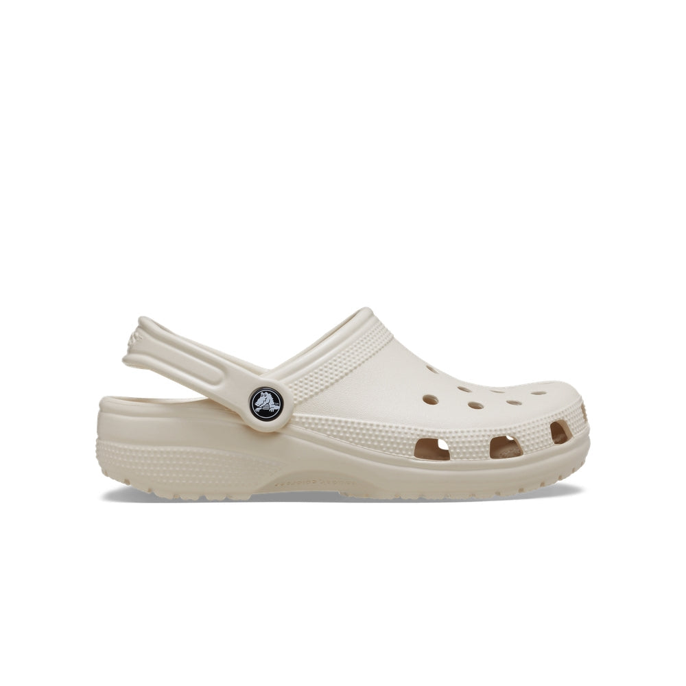 beige clog shoe with a brand logo on a white background