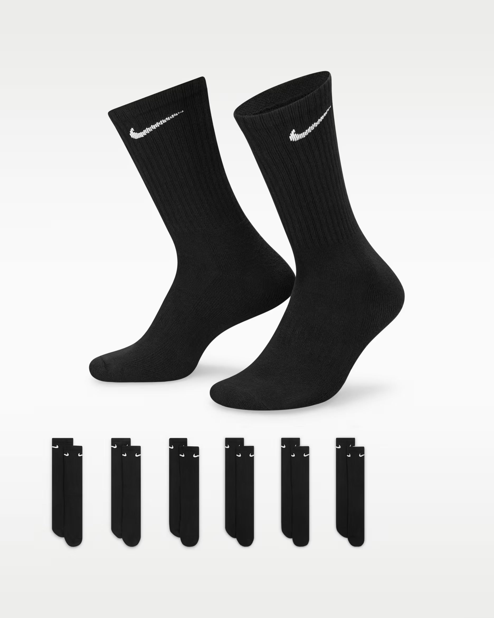Two black socks with Nike logo on a white background, with six black sock packages below.